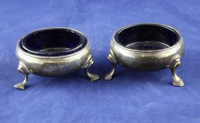 A pair of George III silver bun salts, on hoof feet, rubbed makers mark, London, 1776, 2.25in.