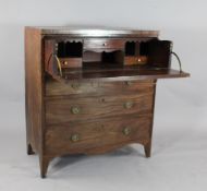 A George III inlaid mahogany secretaire chest, with fitted drawer above three long drawers, on