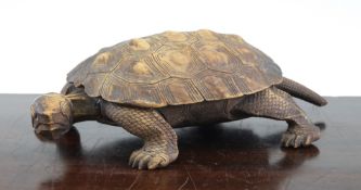 A Japanese wood `tortoise` ink box, early 20th century, with horn inlaid eyes and removable `