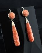 A pair of gold mounted foliate carved coral drop earrings, 2.25in.