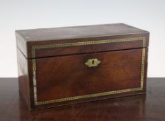 A George IV brass inlaid mahogany tea caddy, with original internal canisters and mixing bowls,