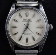 A gentleman`s 1940`s stainless steel Rolex Oyster Perpetual wrist watch, with shaped baton numerals,