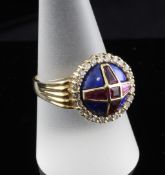 A 14ct gold ruby, diamond and enamel dress ring, of circular form with cruciform set rubies, size