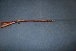 An Enfield percussion cap musket, probably Eastern market, no. 1143, with walnut stock, 48in.