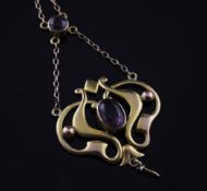 An Edwardian Art Nouveau 9ct gold and amethyst set pendant necklace, (lacking pearl?), chain 18in.