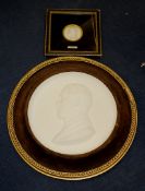 A 19th century carved marble portrait oval of a gentleman, dated 1834, framed, Thomas Agnew & Son