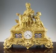 A 19th century French ormolu mantel and Sevres style porcelain mantel clock, surmounted with Ceres