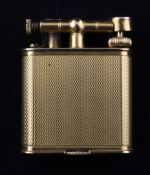 A 1940`s Alfred Dunhill " Unique B" double wheel engine turned 9ct gold petrol lighter, patent no.