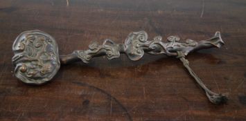 A Chinese hardwood ruyi sceptre, carved in high relief and openwork with lingzhi fungus, 13.5in.