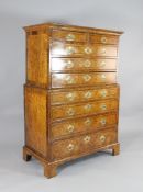 A small burr elm and walnut feather banded chest on chest, 18th century and later, with two short