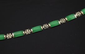 A Chinese 14ct gold and jadeite bracelet, with alternating jadeite and pierced Chinese character