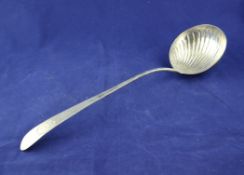 A George III Irish silver Celtic tip soup ladle, with fluted bowl and bright cut handle with