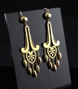 A pair of 15ct drop earrings, of scroll and heart shape, each with five tear shaped drops, 2.5in,