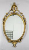 A George III style oval mirror, 4ft x 2ft