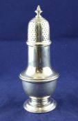 A George V silver sugar sifter, of plain baluster form, Adie Brothers Ltd, Birmingham, 1923, 7.25in,