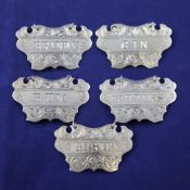 A set of five Victorian silver wine labels, by George Unite, Whiskey, Gin, Rum, Bitters and