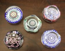 Five Whitefriars millefiori glass paperweights, c.1975-78, comprising a Queen Elizabeth II Silver