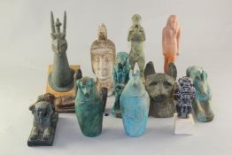 A collection of fourteen ancient Egyptian style pottery and composition antiquities, including two