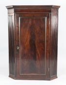 A George III inlaid mahogany hanging corner cabinet, 3ft 8.5ins x 2ft 9ins