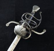 A mid 17th century European steel rapier, c.1660, with 33 inch blade, two shell guards, thumb ring