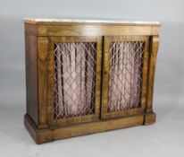 A Regency inlaid rosewood cabinet, with veined marble top above two brass grille doors, on moulded