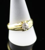An 18ct gold claw set solitaire diamond ring, the central stone approximately 1ct, size X; gross 8.