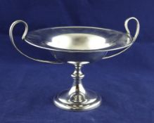 A George V silver two handled tazza, with turned stem and loop handles, William Hutton & Sons,