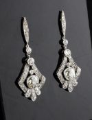A pair of Belle Epoque platinum and diamond drop earrings, each with central brilliant cut stones of