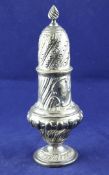 A Victorian silver baluster sugar caster, with embossed spiral finial, Thomas Bradbury & Sons,