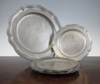 A set of six late 18th century Continental pewter wavy edge plates, by Adrian Klinling, with a