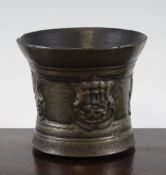 A 16th century Italian bronze mortar, cast with three armorials, 5.25in. (top edge chipped)