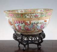 A Chinese Canton decorated famille rose punch bowl, late 19th century, painted with figures in