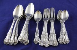 A matched part suite of George IV and later, silver double struck Queens pattern flatware,