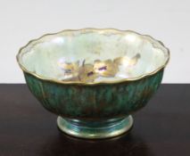 A Wedgwood `dragon and butterfly` lustre bowl, decorated in gilt on pearlescent and green mottled