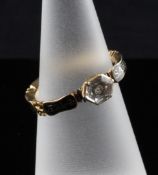A George II gold, black enamel and rock crystal set mourning ring, with hexagonal stone and