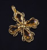 A gold filigree and citrine set cruciform pendant, 1.5in.