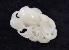 A Chinese pale celadon jade carving of bitter melons and leaves, the stone with brown inclusions,