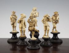 A collection of six late 19th century Bavarian carved ivory comical figures, comprising two