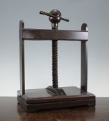 A George III mahogany book press, with turned handles on block feet, 17in.