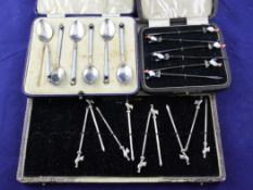 A cased set of six George V silver and enamelled cocktail sticks, with cockerel terminals, John