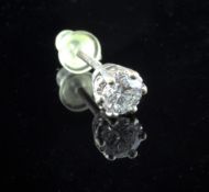 A brilliant cut solitaire diamond ear stud, total weight approximately 0.6ct.