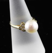 An 18ct gold, cultured pearl and diamond dress ring, size M.