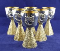 A cased set of six 1970`s parcel gilt silver goblets to commemorate the 13th centenary of Ely