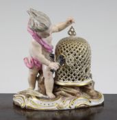 A Meissen figure of `Air`, late 19th century, modelled as a cherub placing a bird in a cage, bellows