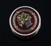 A Russian style gold, gem set and guilloche enamel circular pill box, the lid decorated with applied