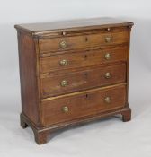 A George II mahogany chest, of four long drawers, with brushing slide on bracket feet, 2ft 3.5in.