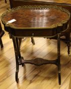 A late 19th century French ormolu mounted and parquetry inlaid rosewood table, with drawer on scroll