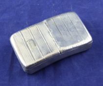 A George III silver rectangular concave double lidded snuff box, with reeded decoration (worn),