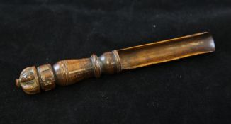 A George II turned fruitwood cheese scoop, carved date and initials 1731, E.B, with crown finial.