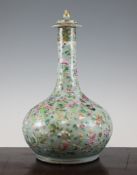 A Chinese Canton decorated famille rose and celadon glazed bottle vase and cover, late 19th century,